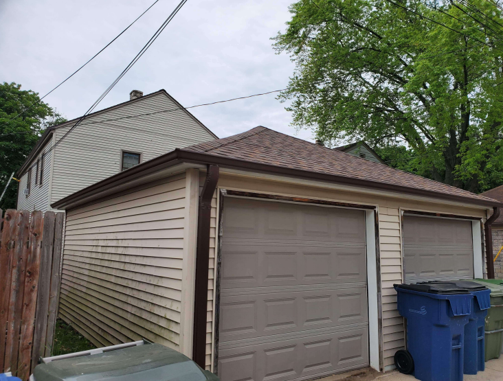 Separate Royal Brown gutter system for Milwaukee Garage