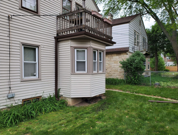 Side view of home with Royal Brown gutters