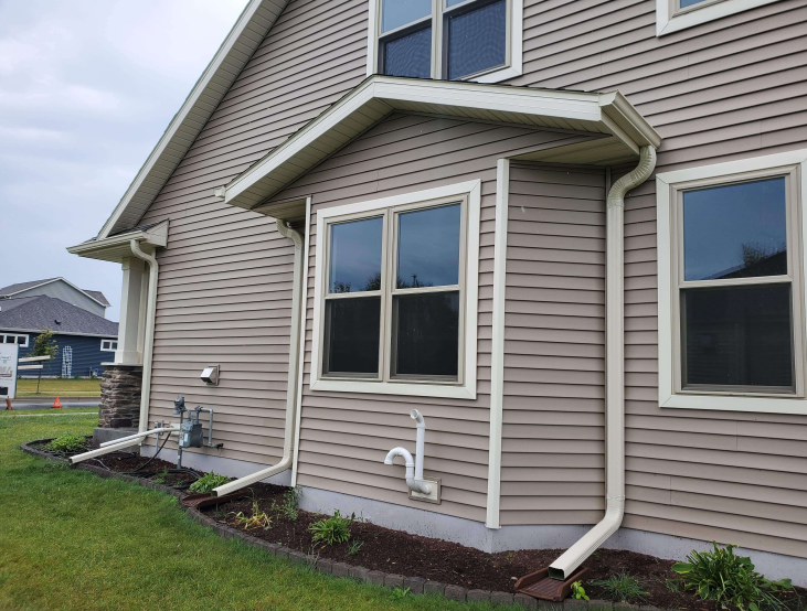 Oconomowoc Almond gutter & downspout system