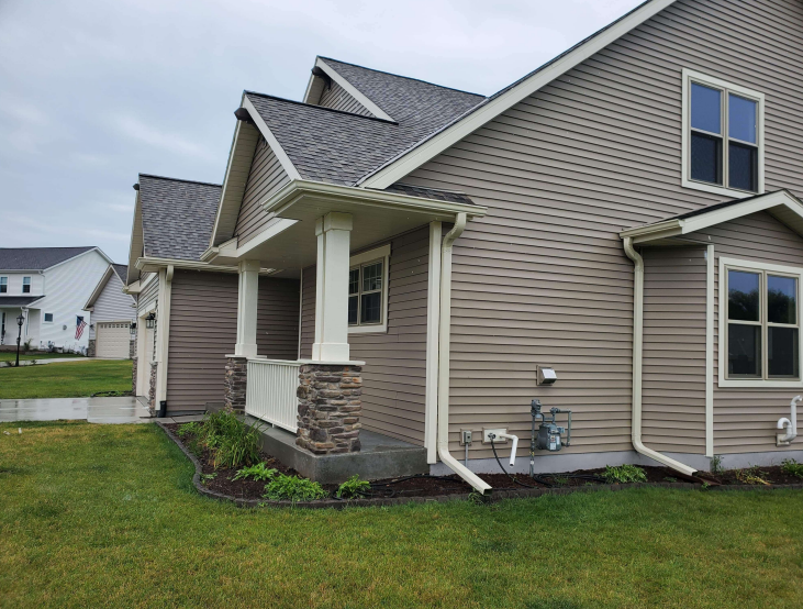 Almond Gutters & Downspouts in Oconomowoc