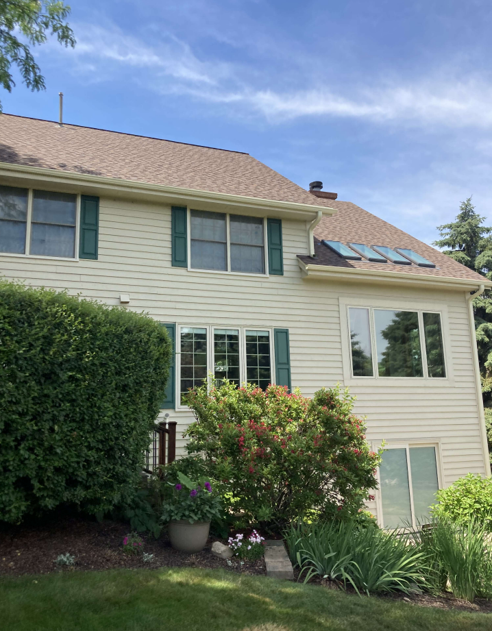 Classic Cream gutters on Pewaukee home